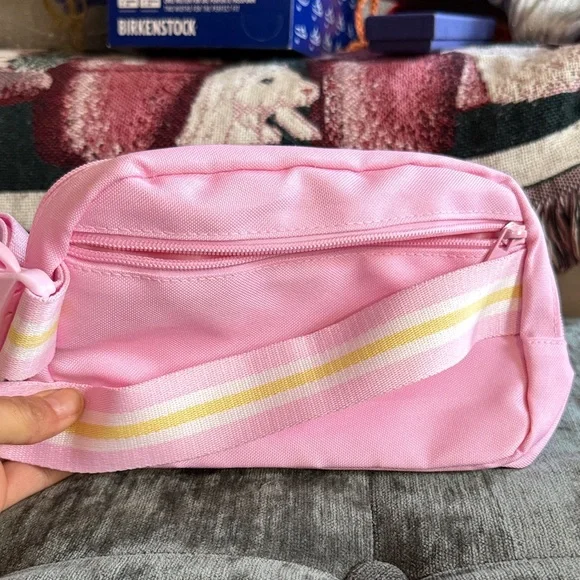 pink canvas crossbody belt bag with striped strap - Picture 5 of 5